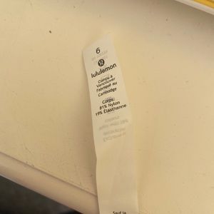 brand new grey-ish white lulu lemons. size 6